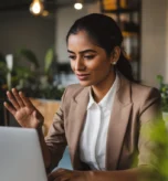 confident-indian-business-woman-using-laptop-computer-working-planning-startup-having-video-call